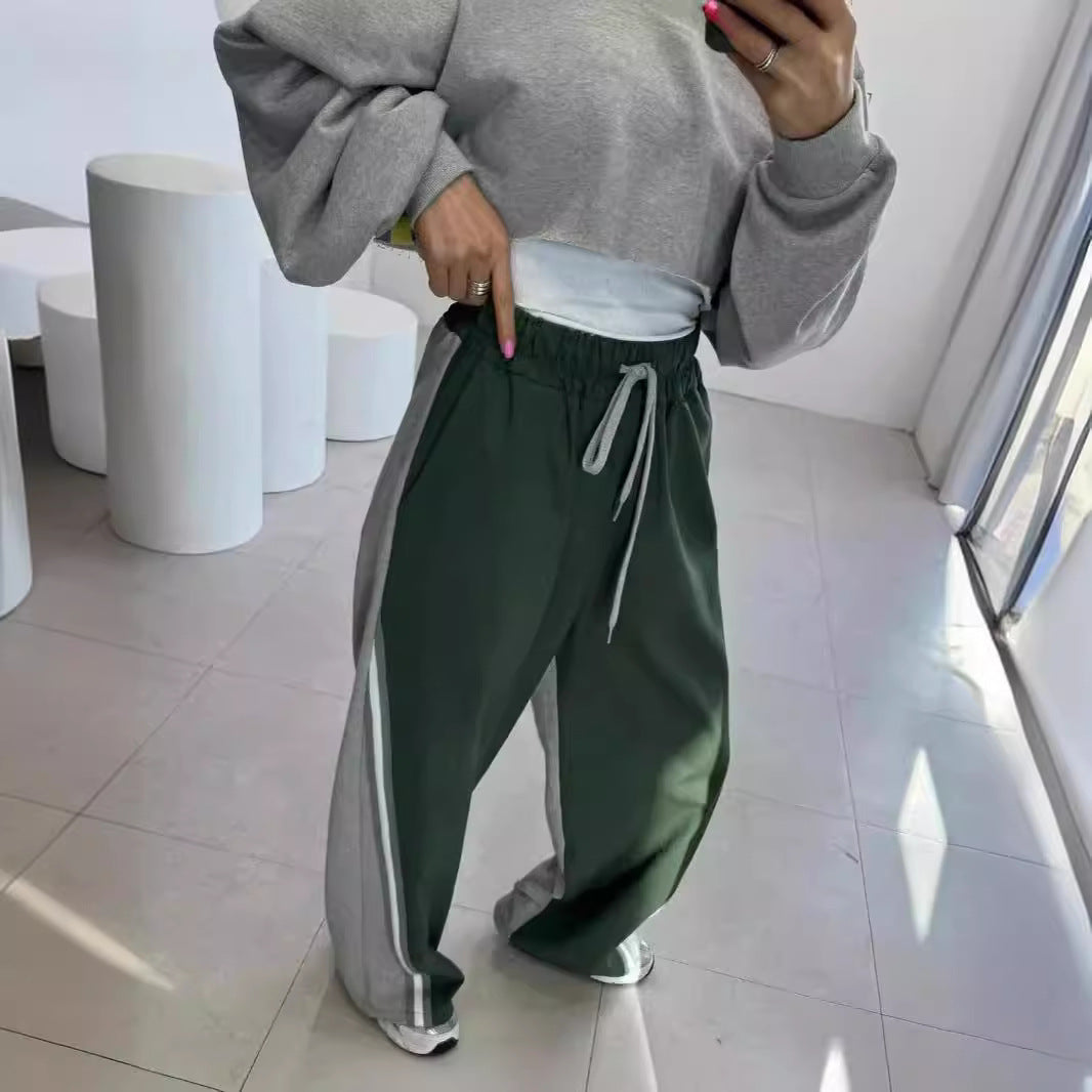 Men's wide trackpants with contrasting side panels, high waistband, and striking side stripe Mune Fashion