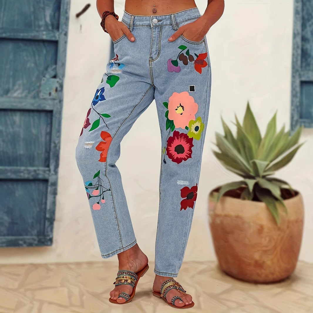 Ladies straight-cut jeans with colorful floral appliqués and light destruction details Mune Fashion