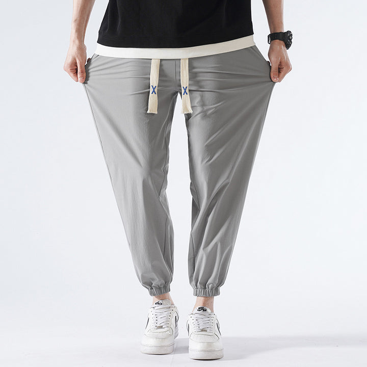 Men's Light Relax-Fit Lounge Pants made of breathable Jersey with elastic tunnel waistband, wide drawstring & ribbed leg cuffs Mune Fashion