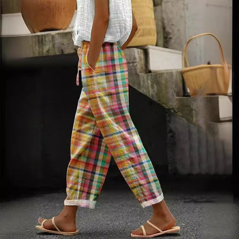 Women's checked linen trousers in palazzo cut with elastic tunnel drawstring waistband and rolled ankle hem Mune Fashion