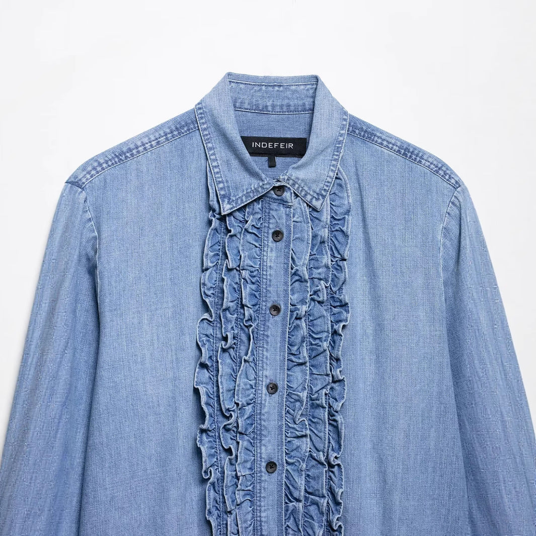 Women's chambray blouse with ruffled button placket, shirt collar and extended hem Mune Fashion