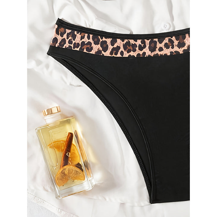 Women's bikini set with comfortable twist design and animal accent Mune Fashion