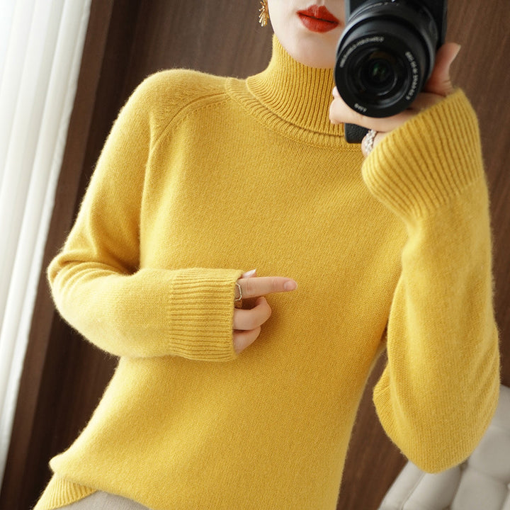 Women's turtleneck sweater made of soft wool blend with extended cuffs Mune Fashion