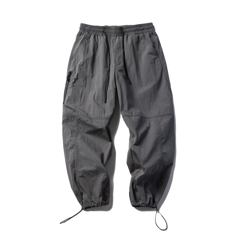Unisex Technical Cargo Pants in Baggy Cut with Drawstring Waist and Adjustable Leg Closures Mune Fashion