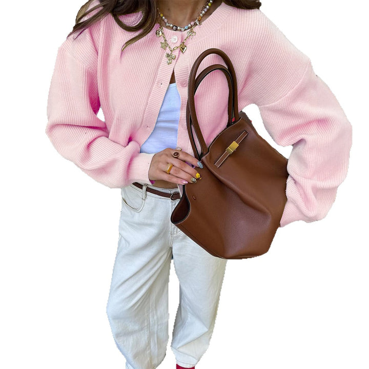 Women's short ribbed cardigan with round neckline, balloon sleeves and distinctive button placket Mune Fashion