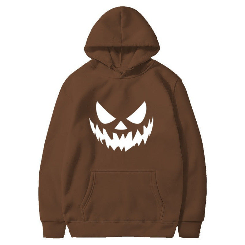 Unisex hooded sweatshirt with creepy pumpkin face print and oversized kangaroo pocket Mune Fashion