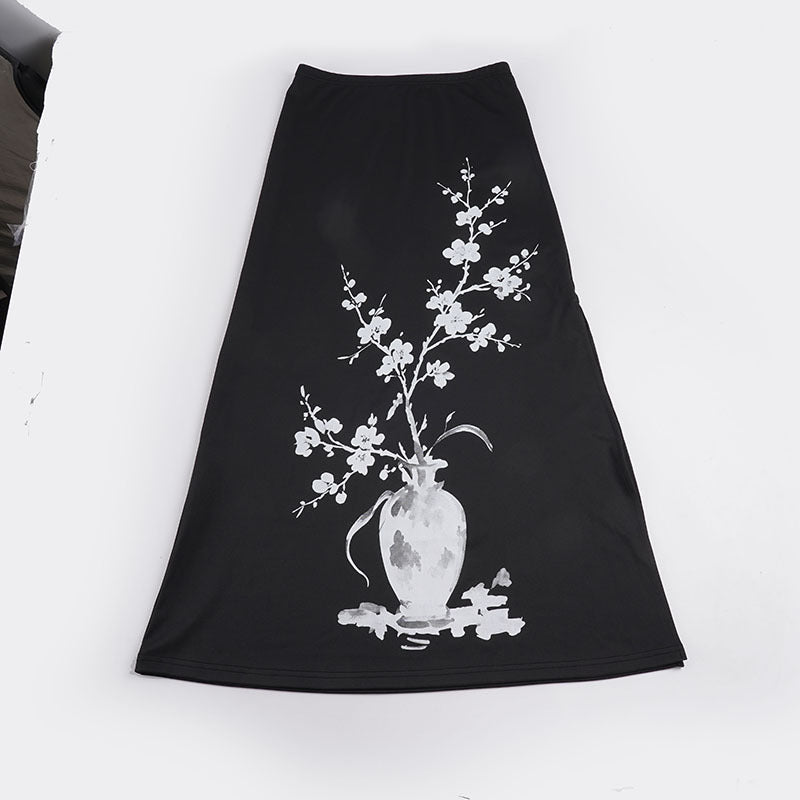Women's flared maxi skirt with A-line cut, elastic waistband, and floral watercolor vase print Mune Fashion