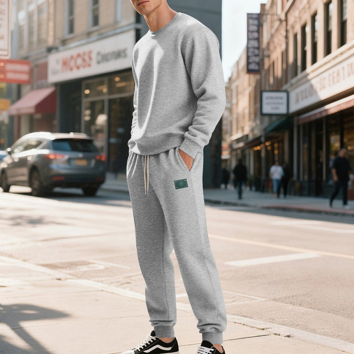 Men's relaxed-fit cotton fleece jogging pants with elastic drawstring, ribbed cuffs, and subtle patch application Mune Fashion