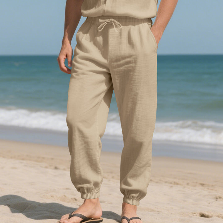 Men's lightweight linen blend lounge pants with drawstring waistband, side pockets, and elastic cuffs Mune Fashion