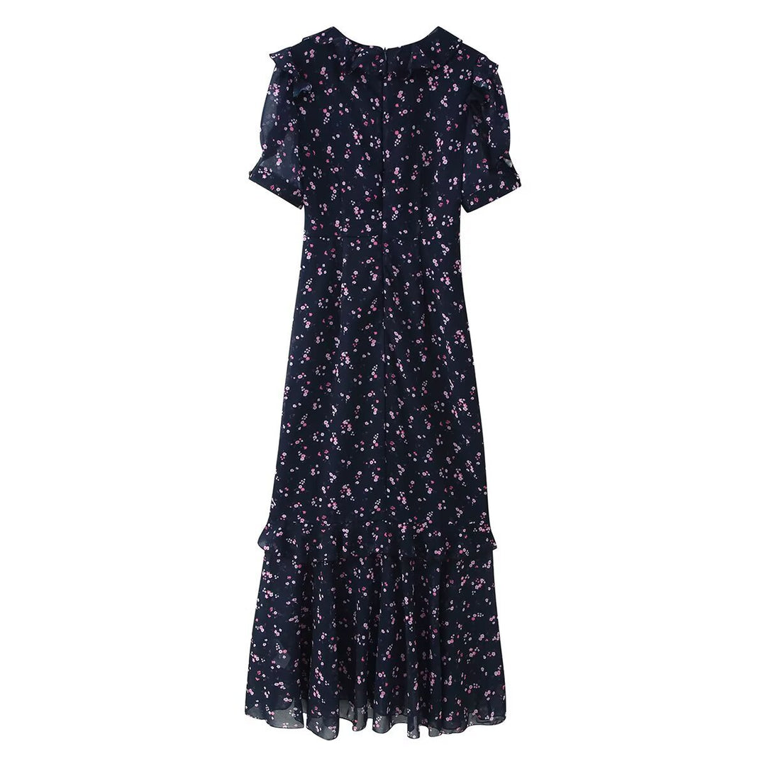 Women’s maxi dress with ruffles, V-neck and floral chiffon look Mune Fashion
