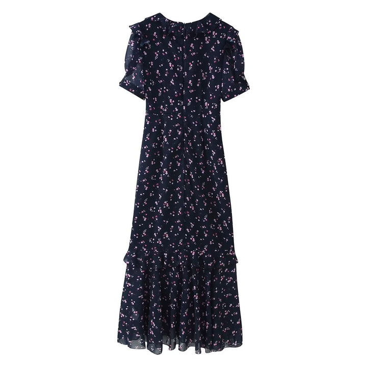 Women’s maxi dress with ruffles, V-neck and floral chiffon look Mune Fashion