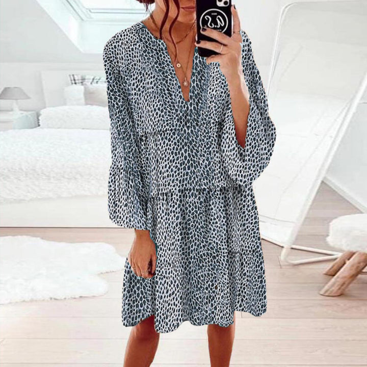 Women's cropped A-line tunic dress with deep V-neck, tiered skirt, and wide batwing sleeves Mune Fashion