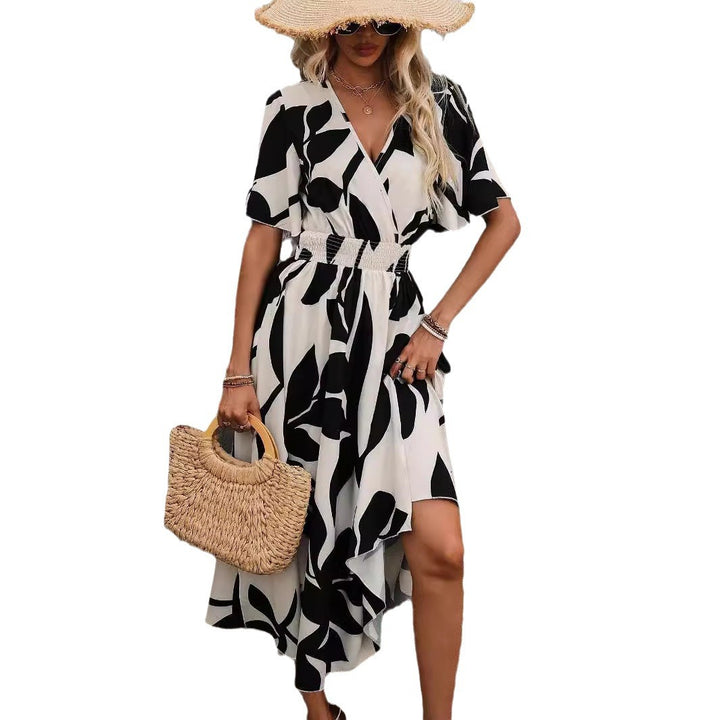 Women’s wrap midi dress with elastic smocked waistband, wide batwing sleeves, and high leg slit Mune Fashion