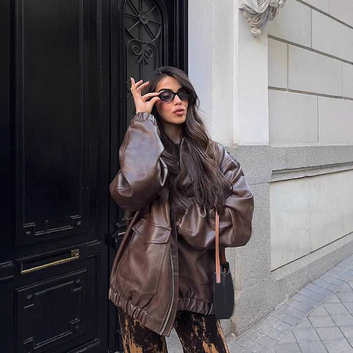 Women's Oversized Vegan Leather Bomber Jacket with Elastic Hem & Large Flap Pockets Mune Fashion