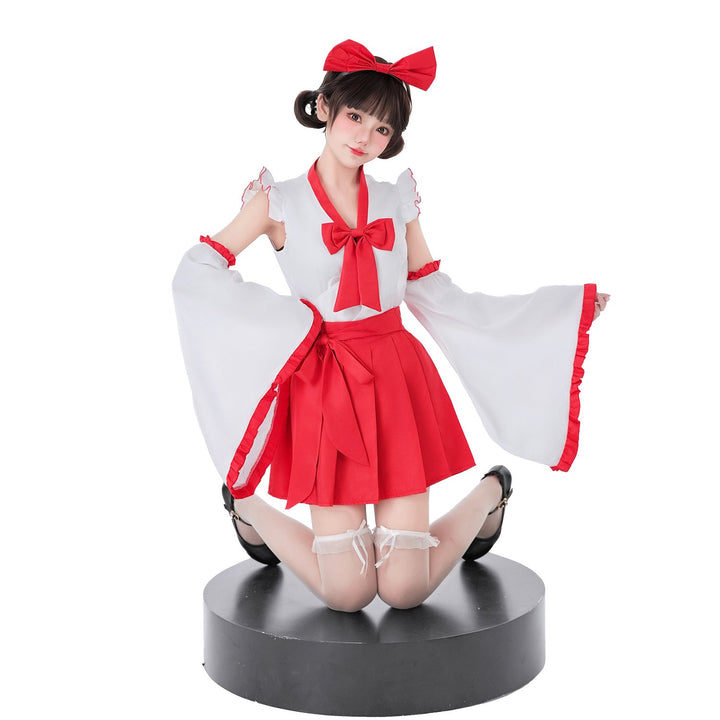 Women playful costume dress with swinging sleeves and decorative bows Mune Fashion
