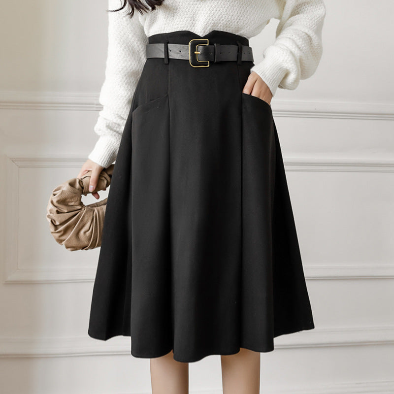 Women's high-waisted flared midi skirt with wide decorative belt, side pockets and flowing drape Mune Fashion