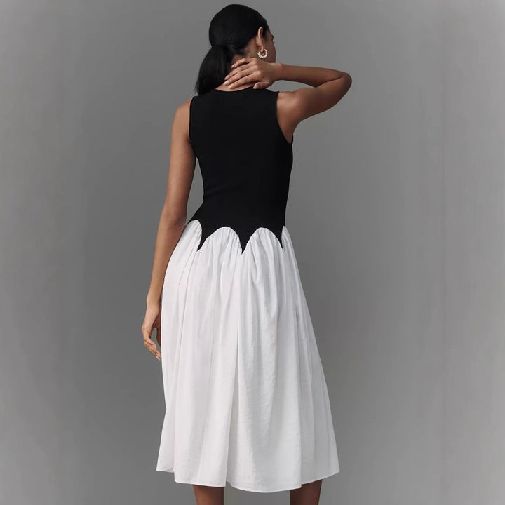 Women’s sleeveless midi dress with fitted ribbed top and flowing tiered skirt Mune Fashion