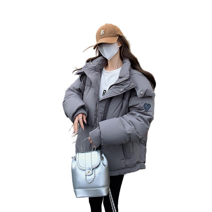 Women's slightly padded oversized quilted jacket with hood and concealed zipper Mune Fashion