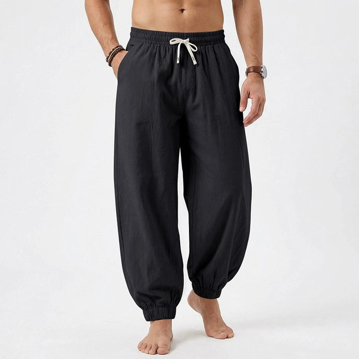 Men's relaxed harem pants made of linen blend with elastic drawstring waistband and gathered ankle closures Mune Fashion