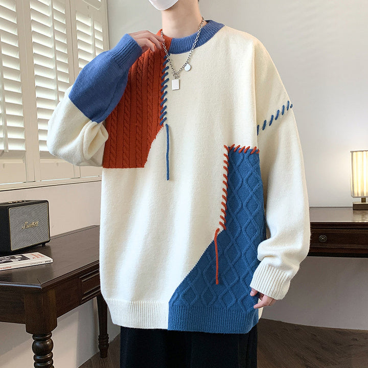 Unisex oversized knit sweater with cable pattern and decorative stitching Mune Fashion
