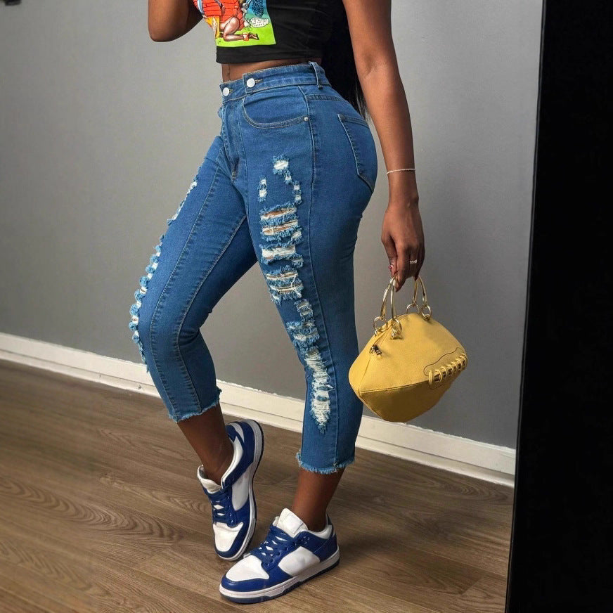 Women's high-cut ankle-length skinny jeans with generous rip details and raw hem Mune Fashion
