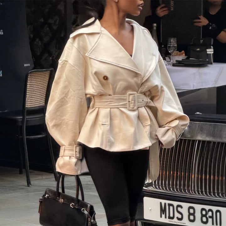 Ladies short trench coat with tailored belt, wide lapels and boxy silhouette Mune Fashion