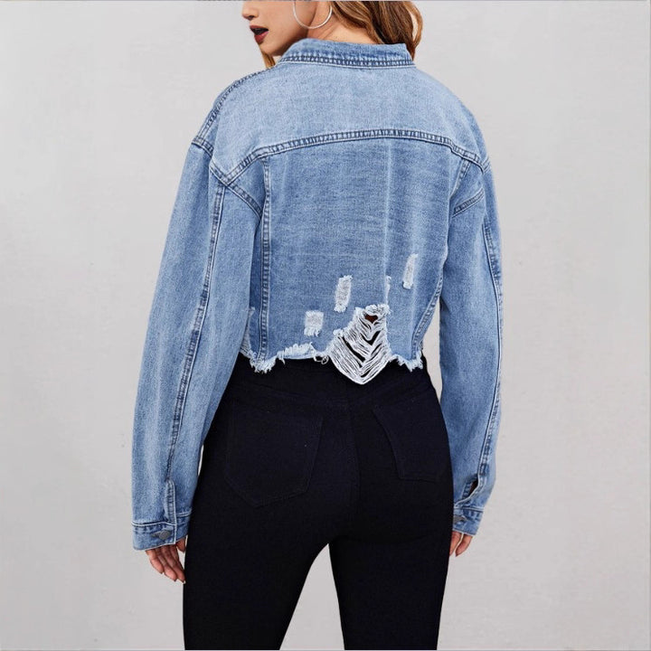 Ladies short denim jacket with pearl embellishments, fringed hem, and wide-cut sleeves Mune Fashion