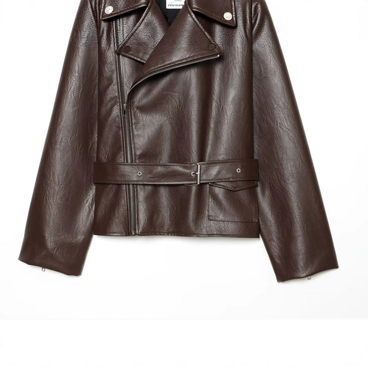 Women's oversized biker jacket made of synthetic leather with a fitted belt and asymmetrical zipper Mune Fashion