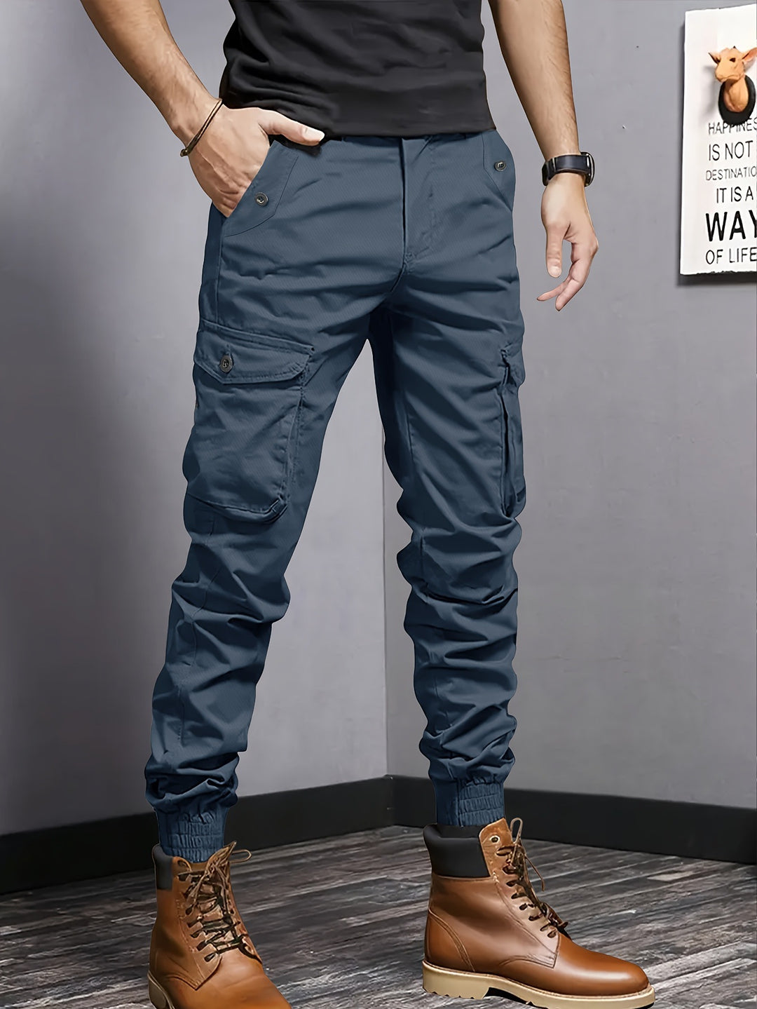 Men's cargo jogger pants with elastic waistband, drawstring, and multifunctional pockets.