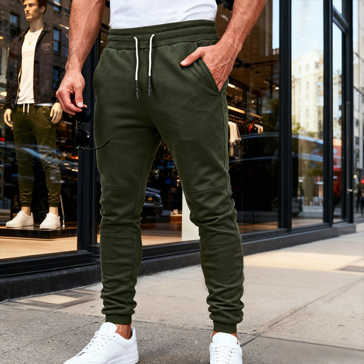 Men's nan tapered jogging pants with knee yoke, elastic drawstring waistband and zippered pockets Mune Fashion