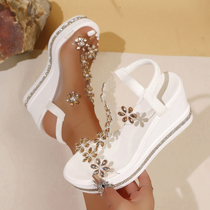 Ladies' platform sandals with transparent PVC strap and floral application Mune Fashion