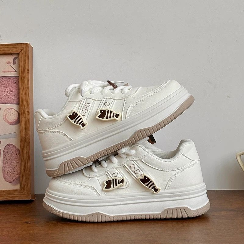 Women's platform sneaker with decorative fish charms and padded comfort insole Mune Fashion