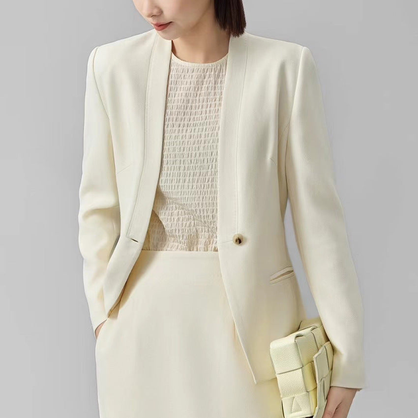 Women’s fitted single-button blazer with minimalist V-front and slip pockets Mune Fashion