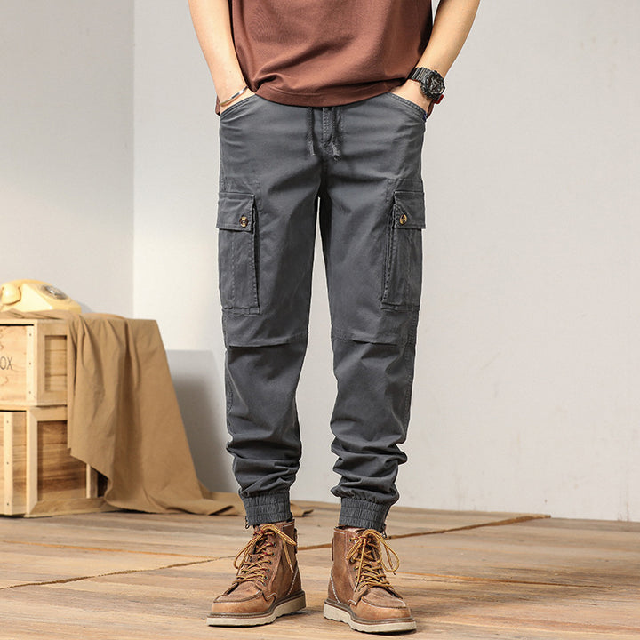 Men's Multifunctional Canvas Cargo Pants in Jogger Style with Elastic Ankle Cuffs, Flap Pockets, and Knee Reinforcement Mune Fashion