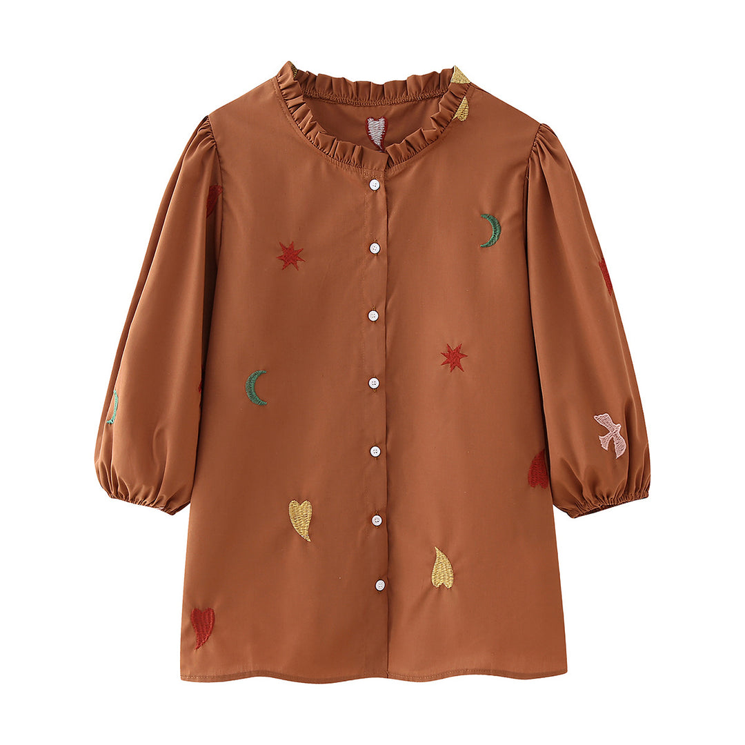 Ladies embroidered tunic blouse with ruffled collar, continuous button placket and balloon sleeves Mune Fashion