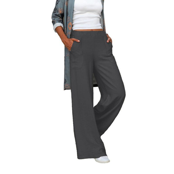 Women’s wide linen blend pants with high elastic waistband and applied side pockets Mune Fashion