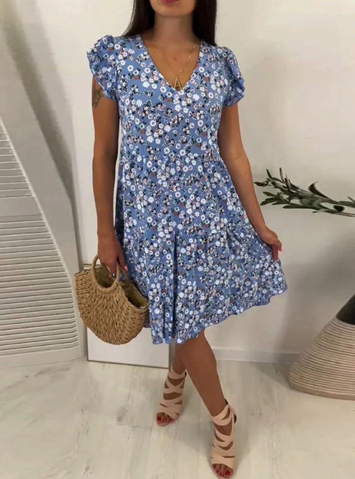 Ladies' V-neck tiered dress with puff sleeves and fitted underbust seam Mune Fashion