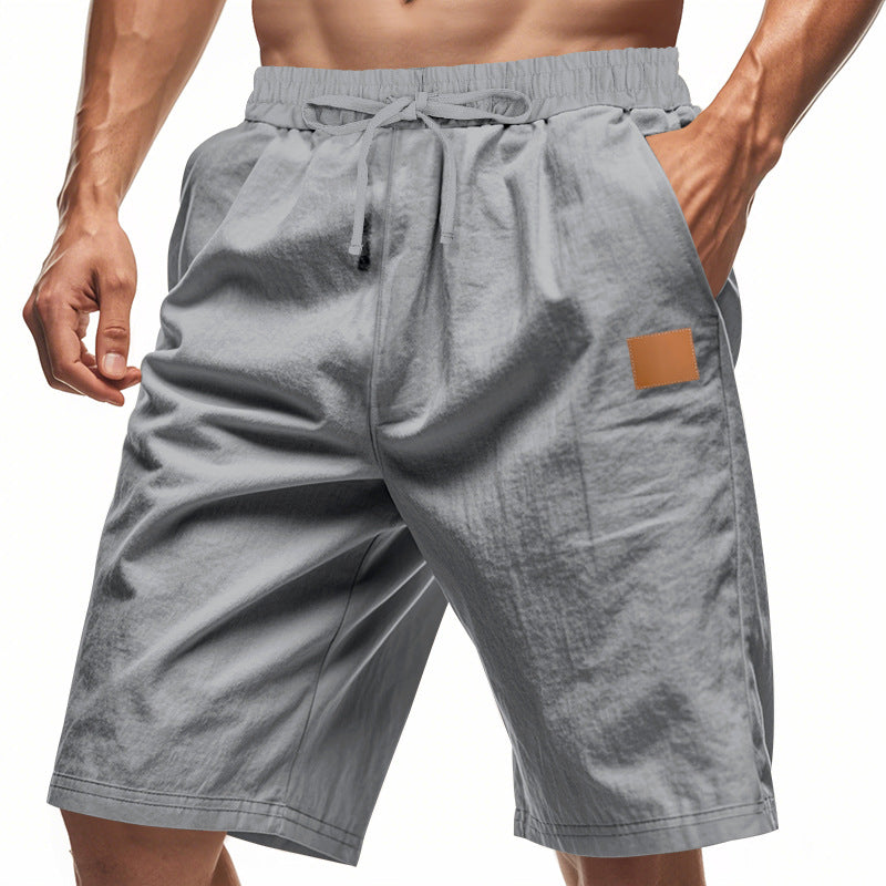 Men's lightweight casual Bermuda shorts with elastic waistband, drawstring and discreet leather application Mune Fashion