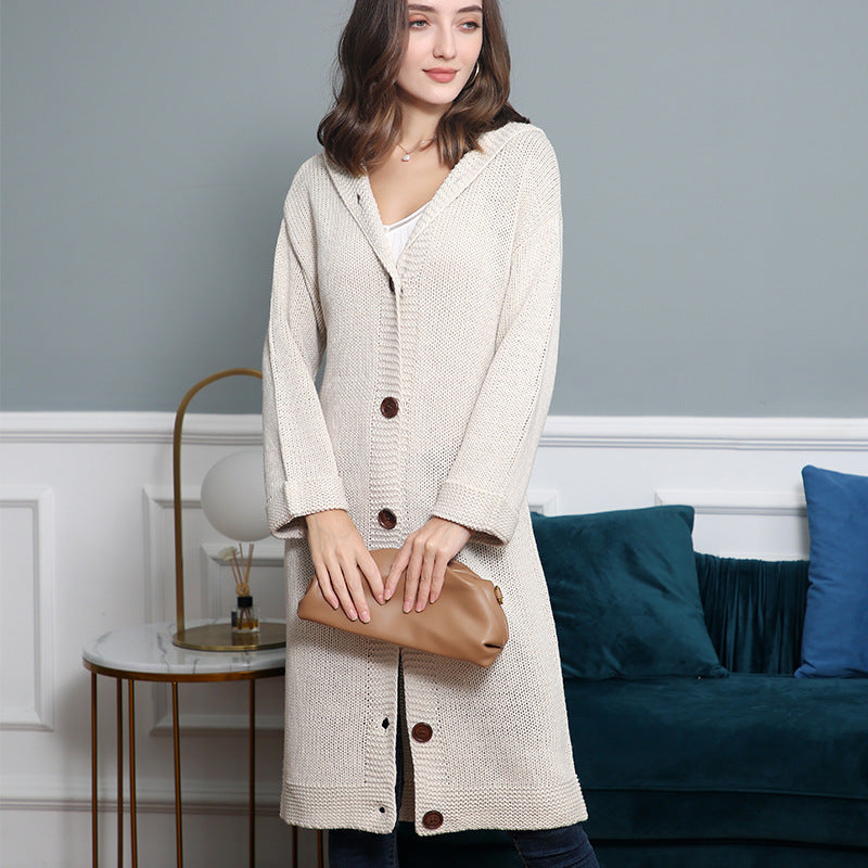 Women's Hooded Long Cardigan made of medium-thick ribbed knit with a full button placket and loose oversized cut Mune Fashion