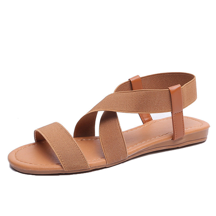 Women's flat elastic strap sandals with crossed stretch bands and padded comfort footbed Mune Fashion
