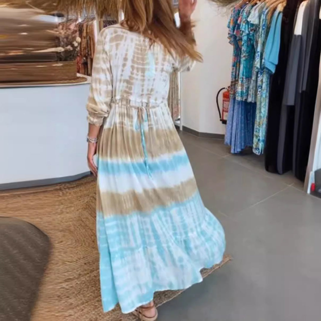 Women's airy batik tiered dress with V-neck, empire waist, and elastic sleeves Mune Fashion