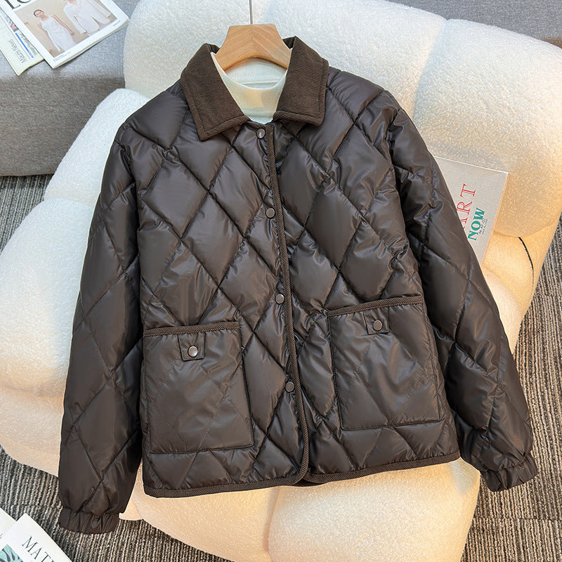 Women’s short quilted jacket with diamond stitching, cord collar, and flap pockets Mune Fashion
