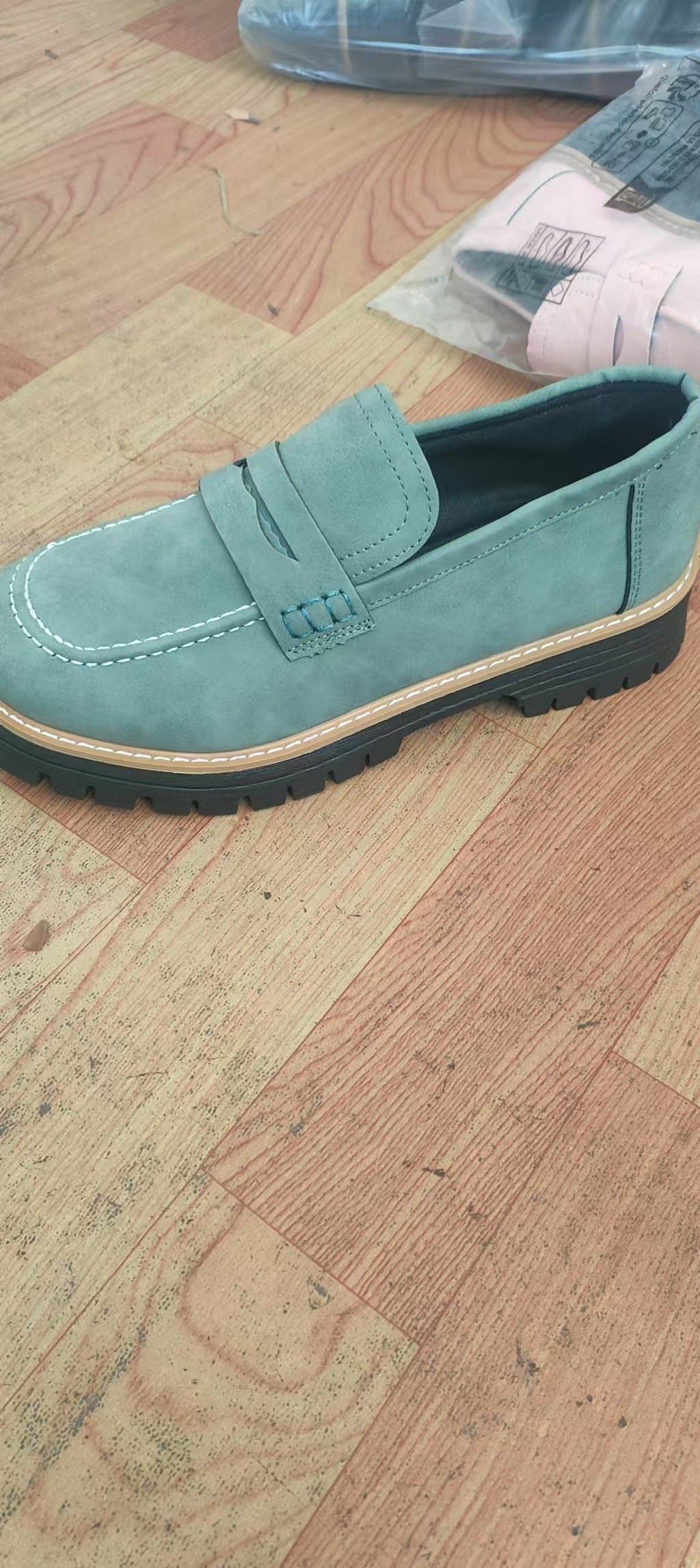 Men's robust penny loafers with distinctive profile sole, handcrafted decorative stitching, and padded comfort footbed Mune Fashion
