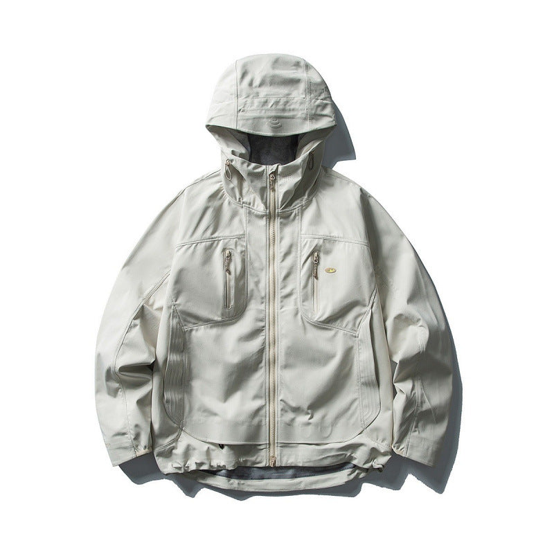 Unisex Technical Softshell Field Jacket with welded seams, four zippered pockets, and extended back part Mune Fashion