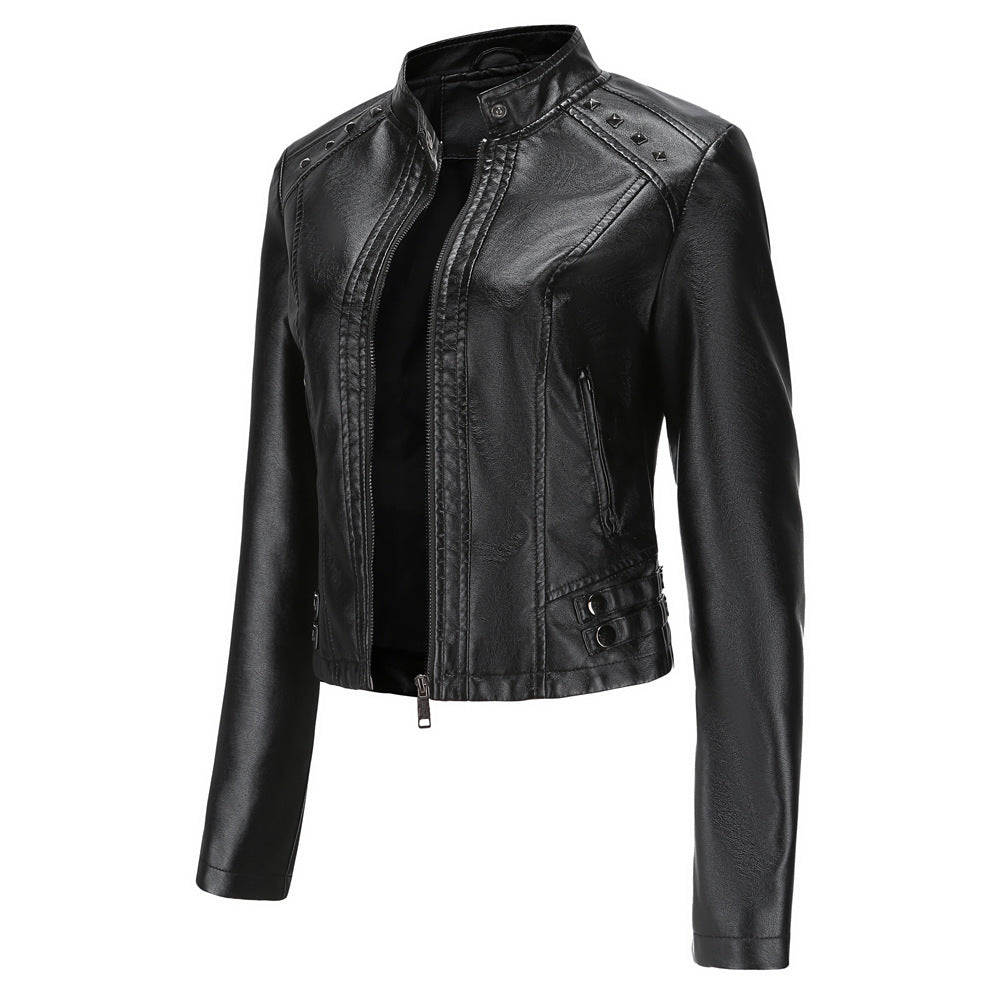 Women's short fitted faux leather jacket with studded detailing and stand-up collar Mune Fashion