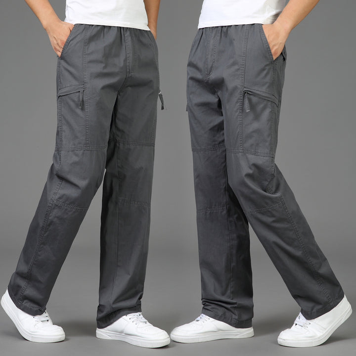 Women’s loose cargo pants with elastic waistband, multiple pockets and knee darts Mune Fashion