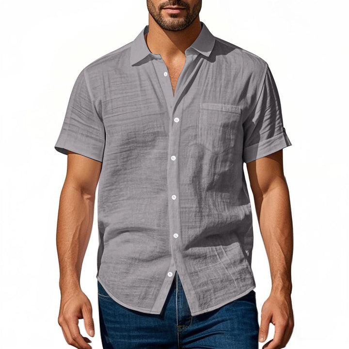 Men's short-sleeved casual shirt made of linen blend with chest pocket and rounded hem Mune Fashion