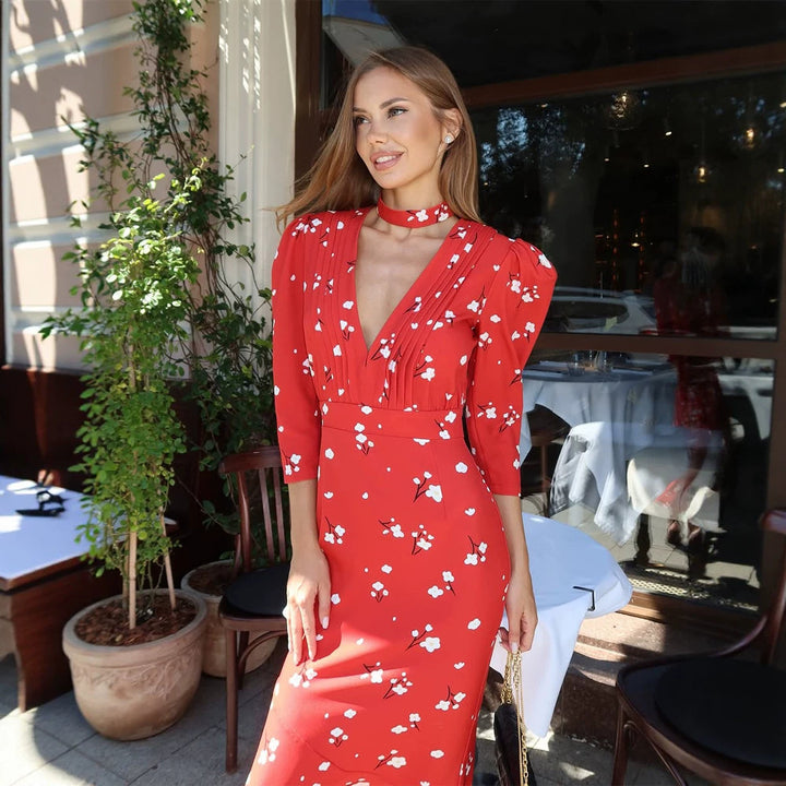 Women's vintage-inspired maxi dress with puff sleeves, fitted silhouette, and pleated neckline Mune Fashion