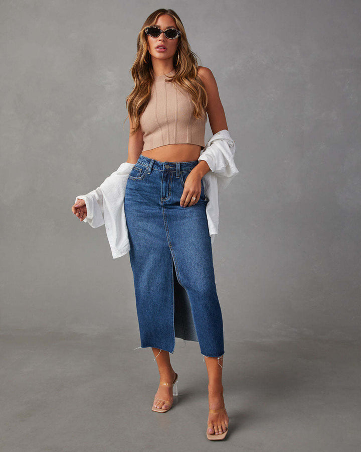 Women's high-waisted midi denim skirt with center front slit and raw hem Mune Fashion