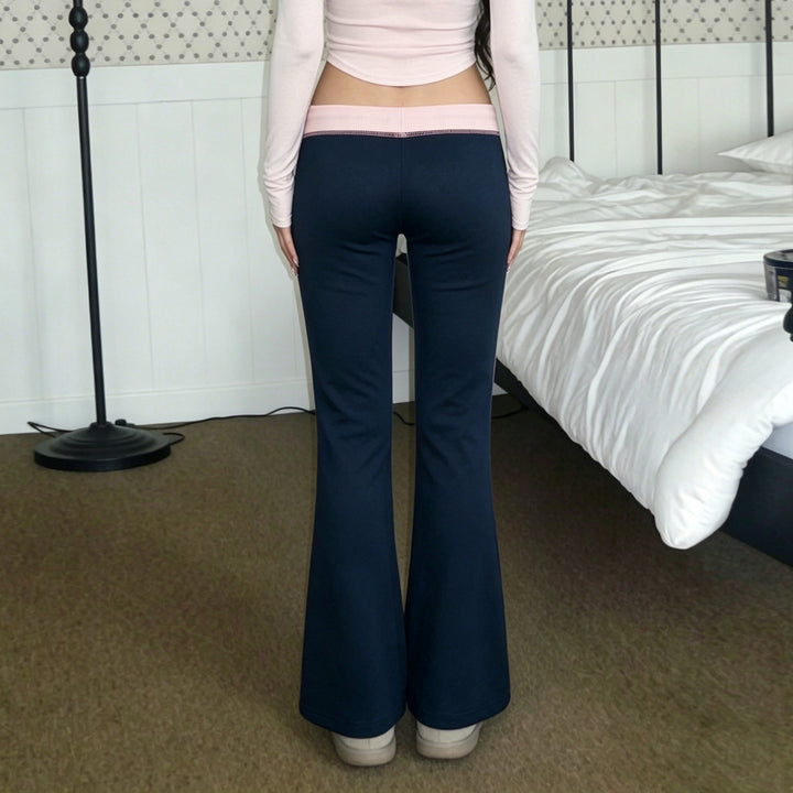 Women nan flared sweatpants with high waistband, drawstring, and contrasting decorative seams Mune Fashion